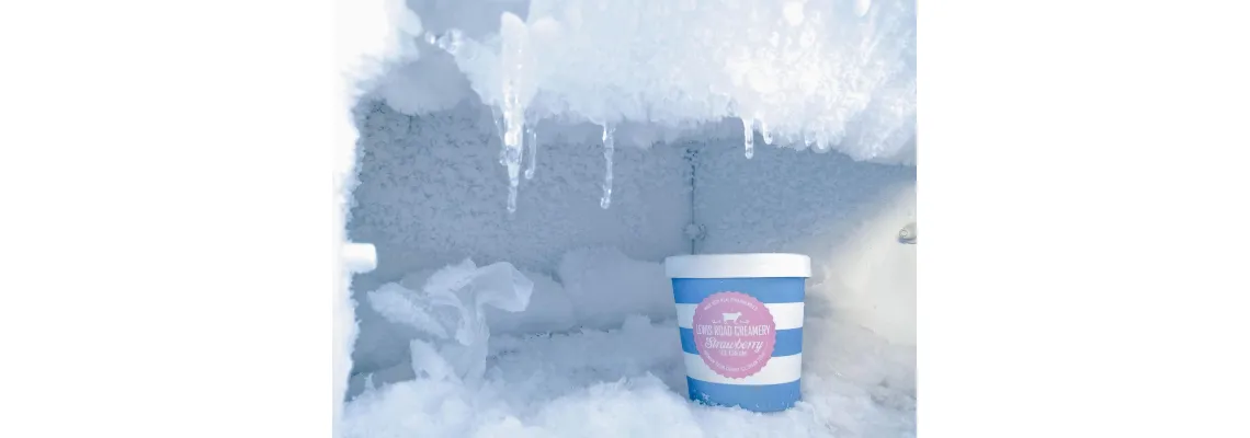 How often should the freezer be defrosted?